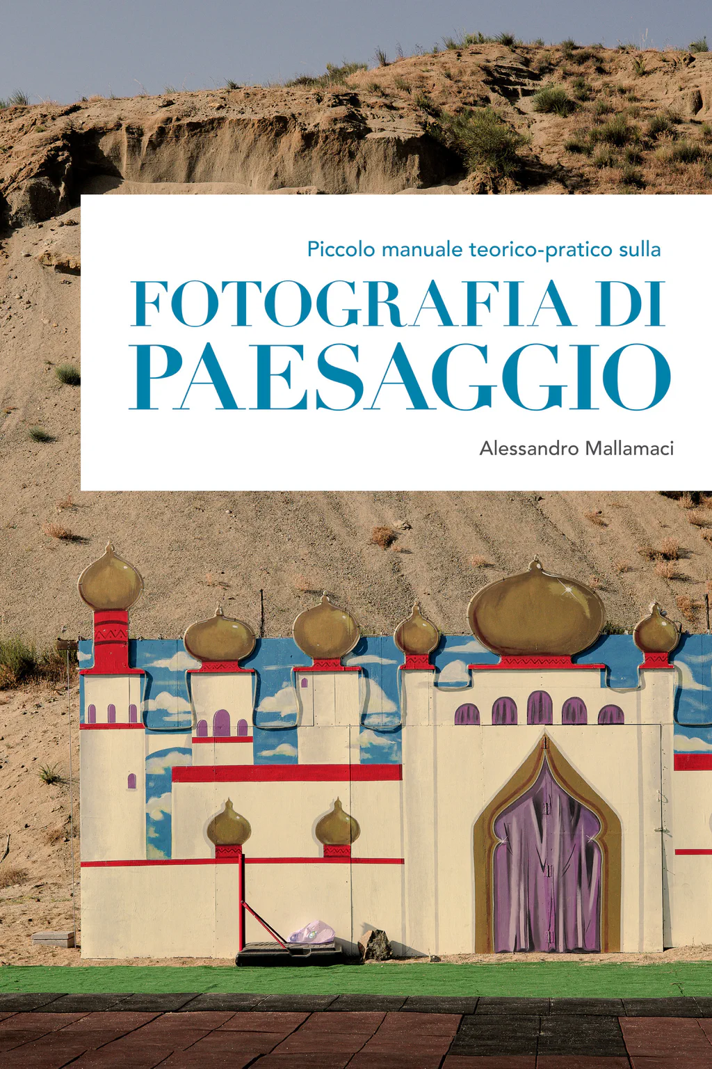 The cover of Piccolo manuale teorico-pratico sulla fotografia di paesaggio: a painted fairground castle at the foot of an eroded slope