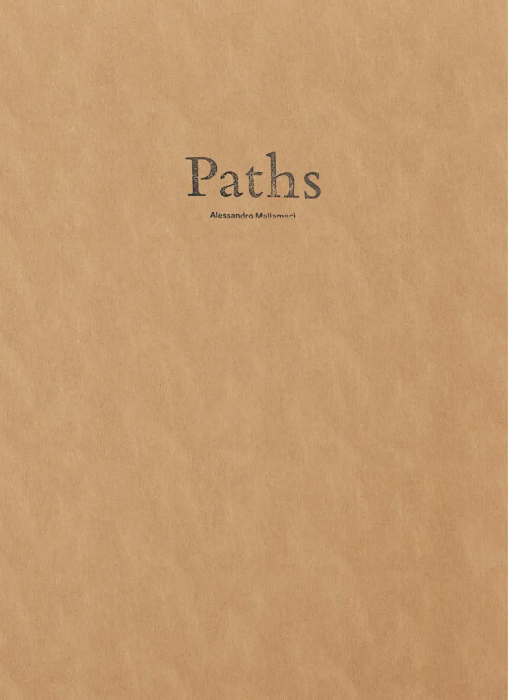 The cover of Paths: sand-coloured board with the title hand-painted through a stencil, the spine left exposed