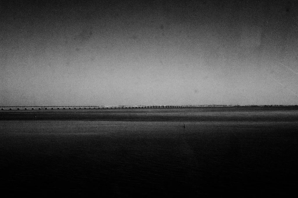 The long bridge over the estuary at dusk