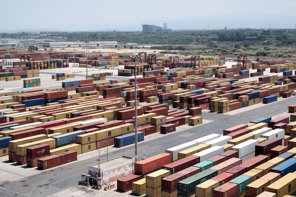 Container yard seen from above, stacks reaching to the horizon