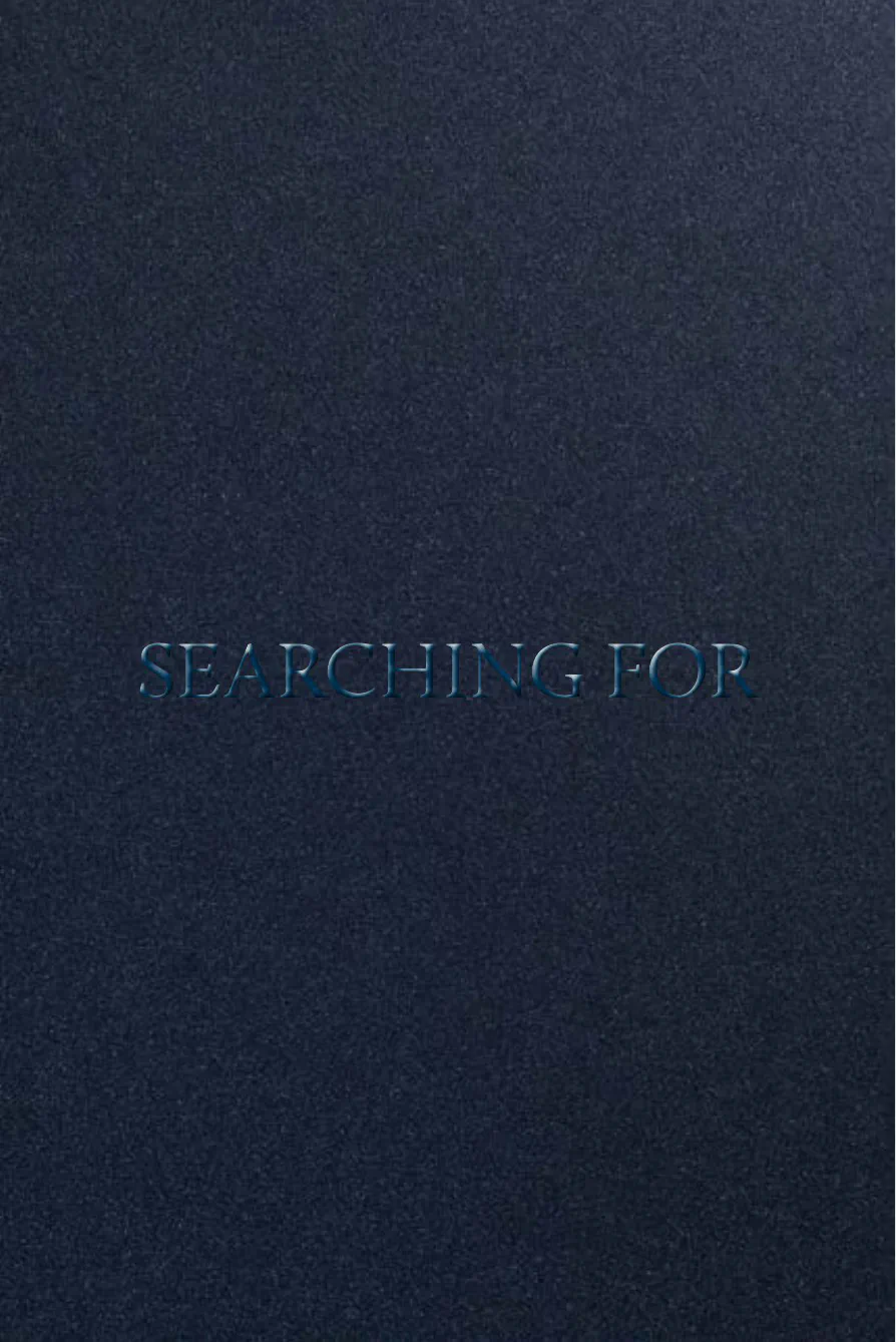 The cover of Searching for: midnight blue board with the title blind-stamped