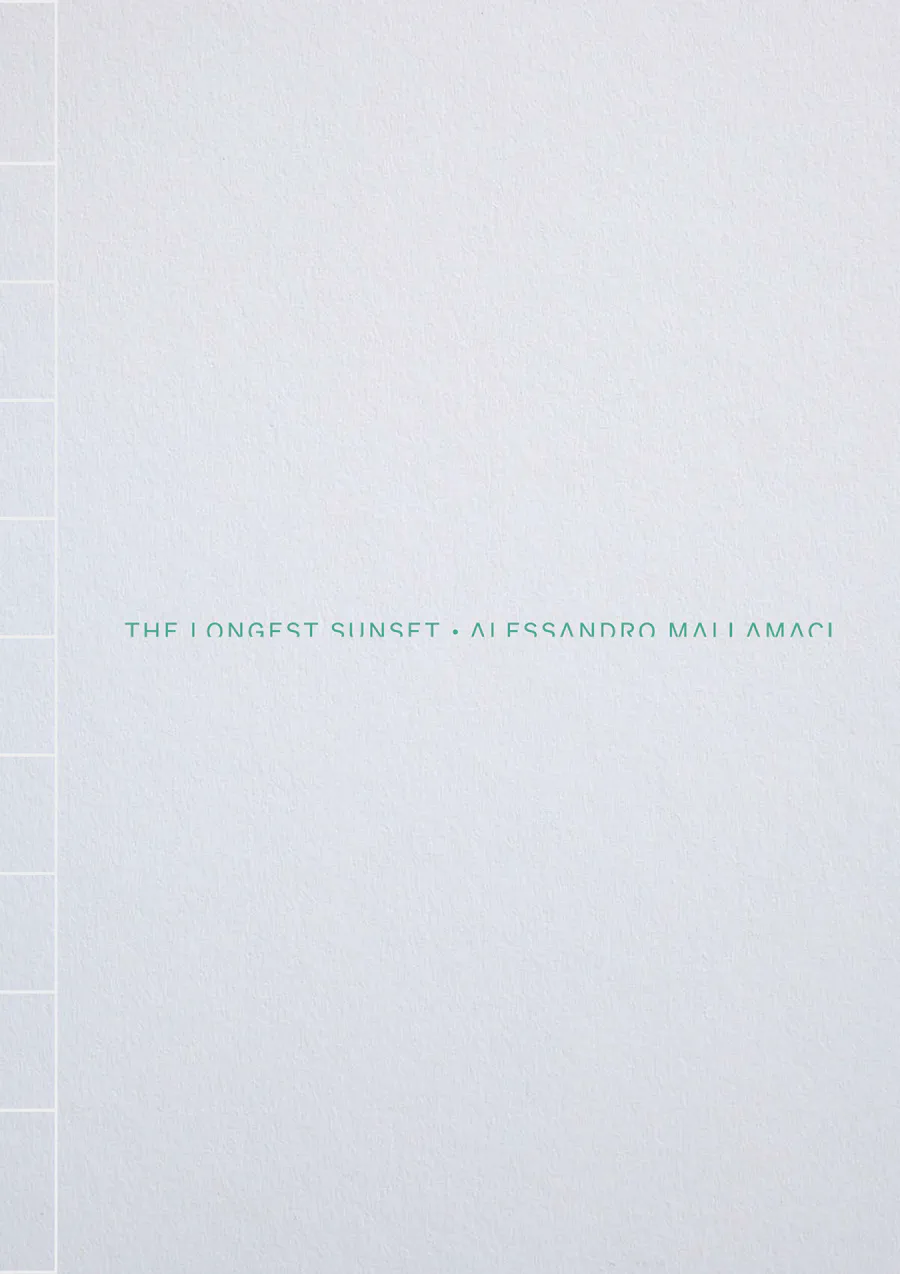 The cover of The Longest Sunset: embossed white paper with the title in pale blue