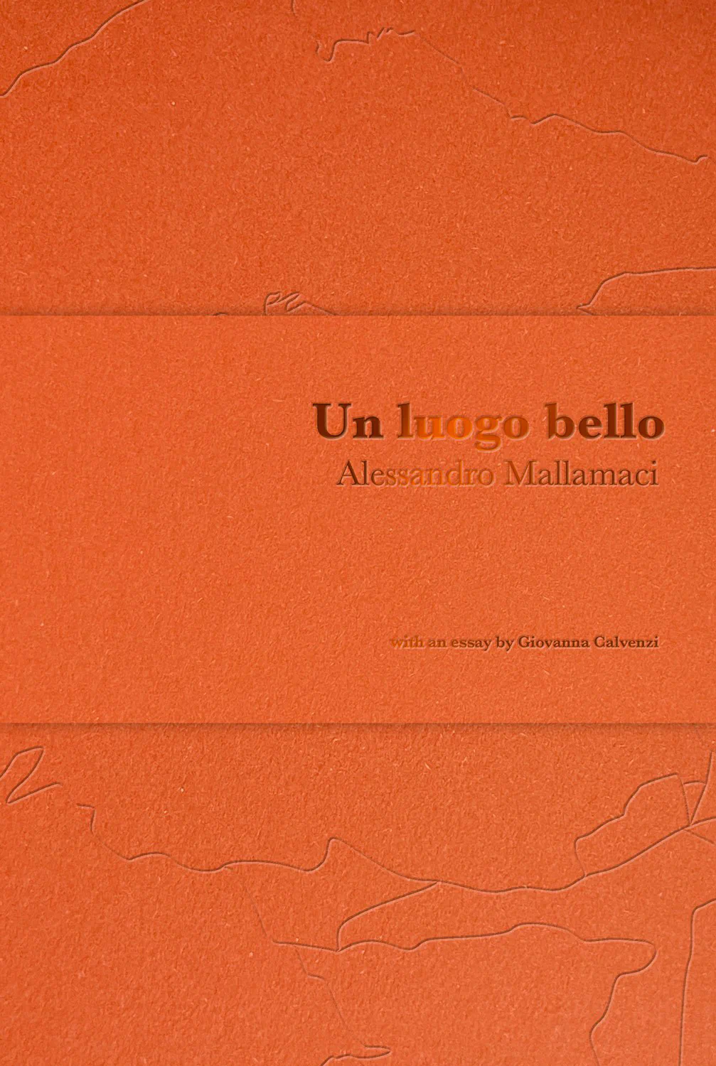 The cover of Un luogo bello: orange Fedrigoni Materica board with a blind-stamped title
